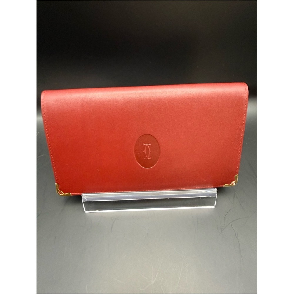 Cartier Long Red Leather Bifold Wallet with Embossed Logo and Gold Corners
